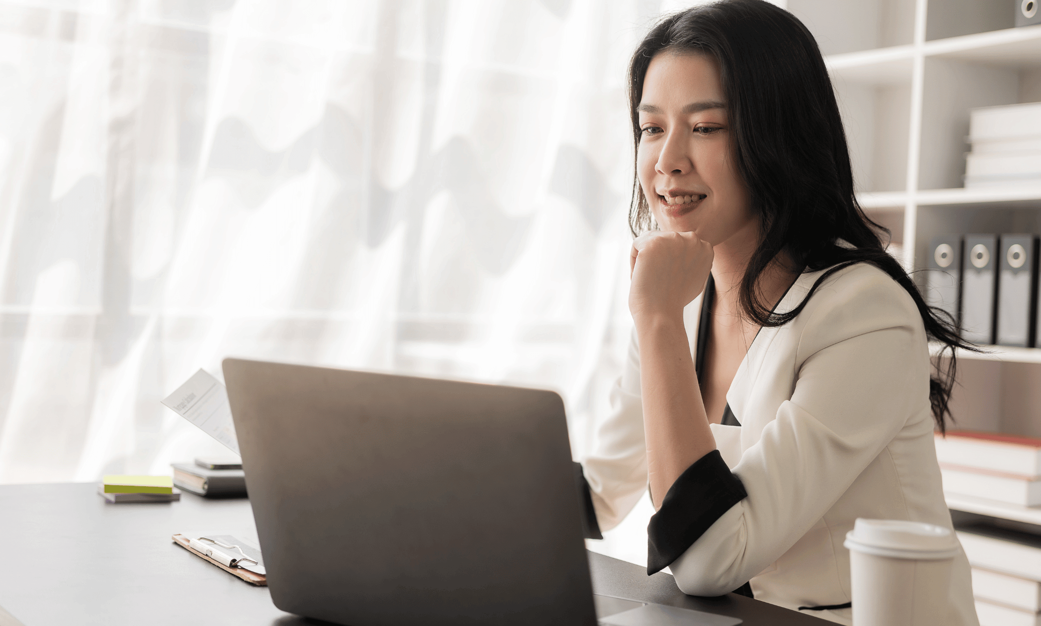 A person looking at a computer.