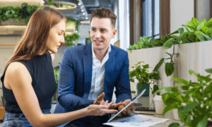 Two business people discussing work.